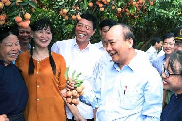 Thủ tướng: “Nông dân Bắc Giang phải là người tham gia thanh toán điện tử tốt nhất” - Ảnh 1.