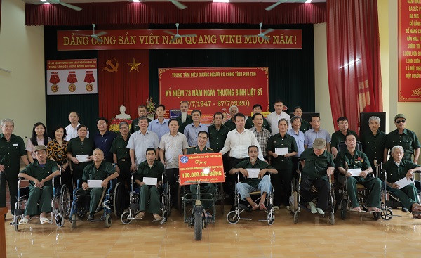 BHXH Việt Nam tri ân thương binh, bệnh binh nhân kỷ niệm 73 năm ngày thương binh liệt sỹ - Ảnh 1.