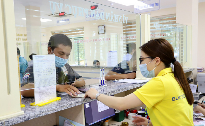 Bưu chính Việt Nam hướng đến 100% hộ gia đình có Địa chỉ số - Ảnh 1.