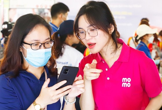 MoMo thúc đẩy thanh toán không tiền mặt tại nhiều tỉnh thành  ​ ảnh 1