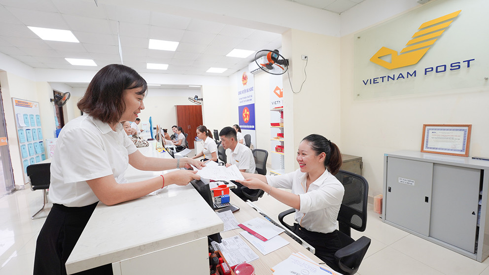 Tuyên Quang: Hồ sơ giải quyết TTHC qua Bưu điện tăng 98% - Ảnh 1.