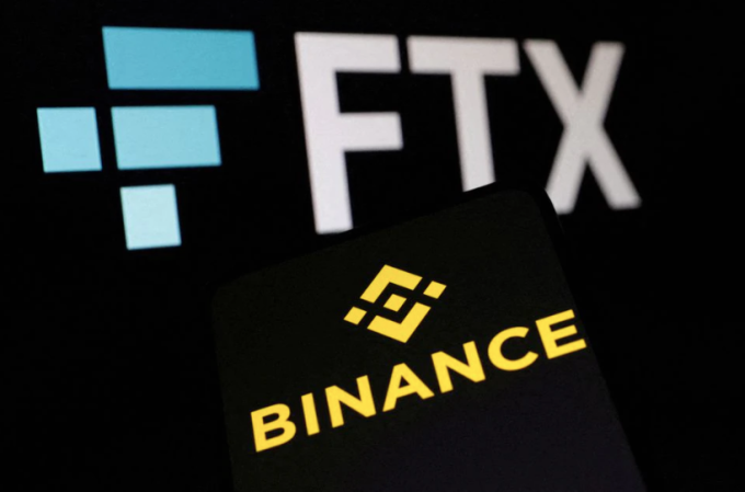 Ảnh chụp màn hình logo FTX và Binance ngày 8/11. Ảnh: Reuters