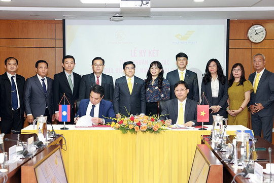 Việt Nam tăng cường hợp tác, hỗ trợ CNTT, nghiệp vụ cho Bưu chính Lào