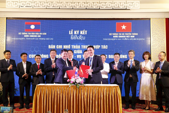 Việt Nam - Lào ký kết hợp tác chuyển đổi số lĩnh vực thông tin đối ngoại