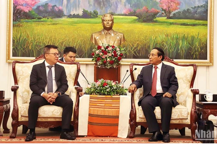 Lãnh đạo Đảng, Nhà nước Lào tiếp thân mật Đoàn đại biểu Báo Nhân Dân