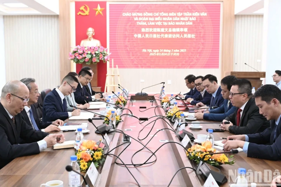 Báo Nhân Dân ký các Bản ghi nhớ hợp tác với Nhân Dân nhật báo và Tân Hoa xã